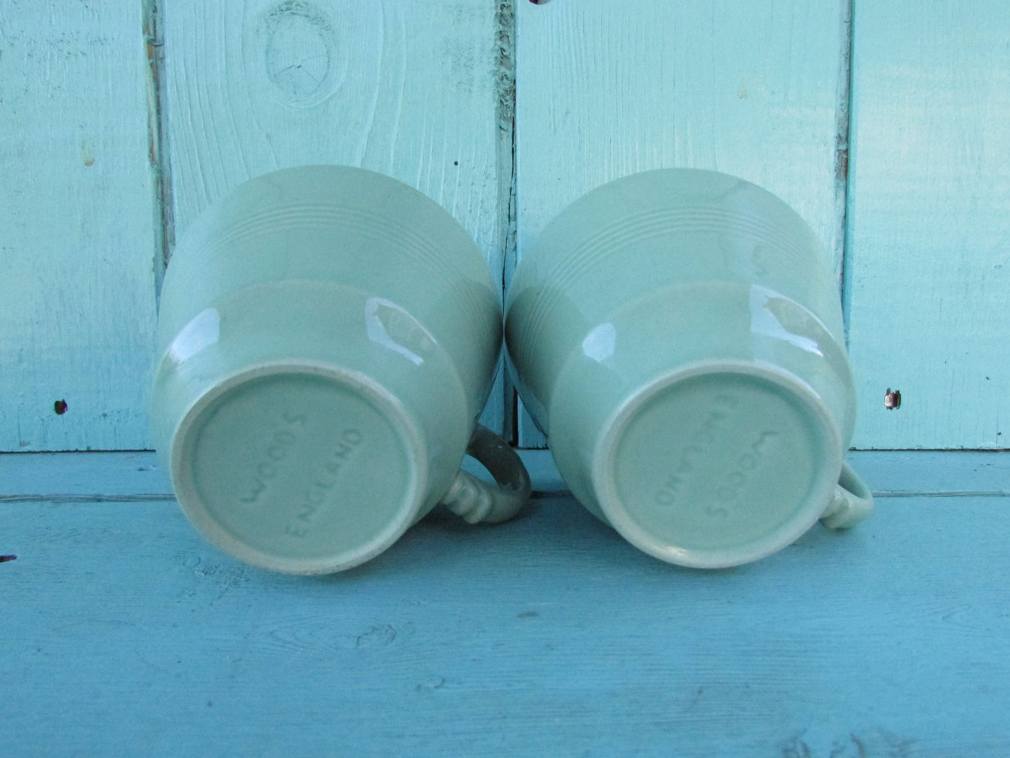 Two 1940s Wood's Ware Beryl green teacups and saucers