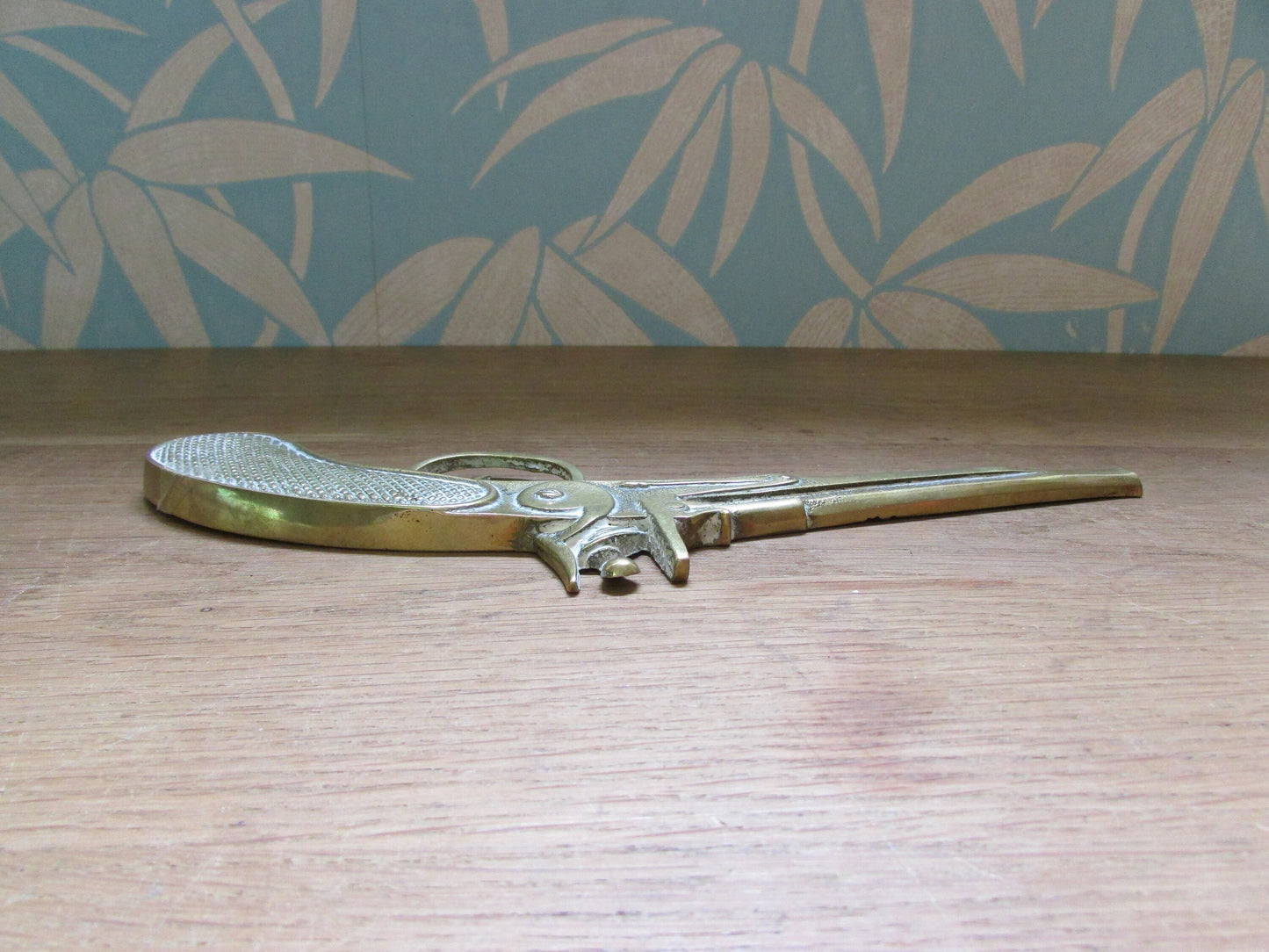 Pair of vintage wall hanging flat brass flintlock pistols