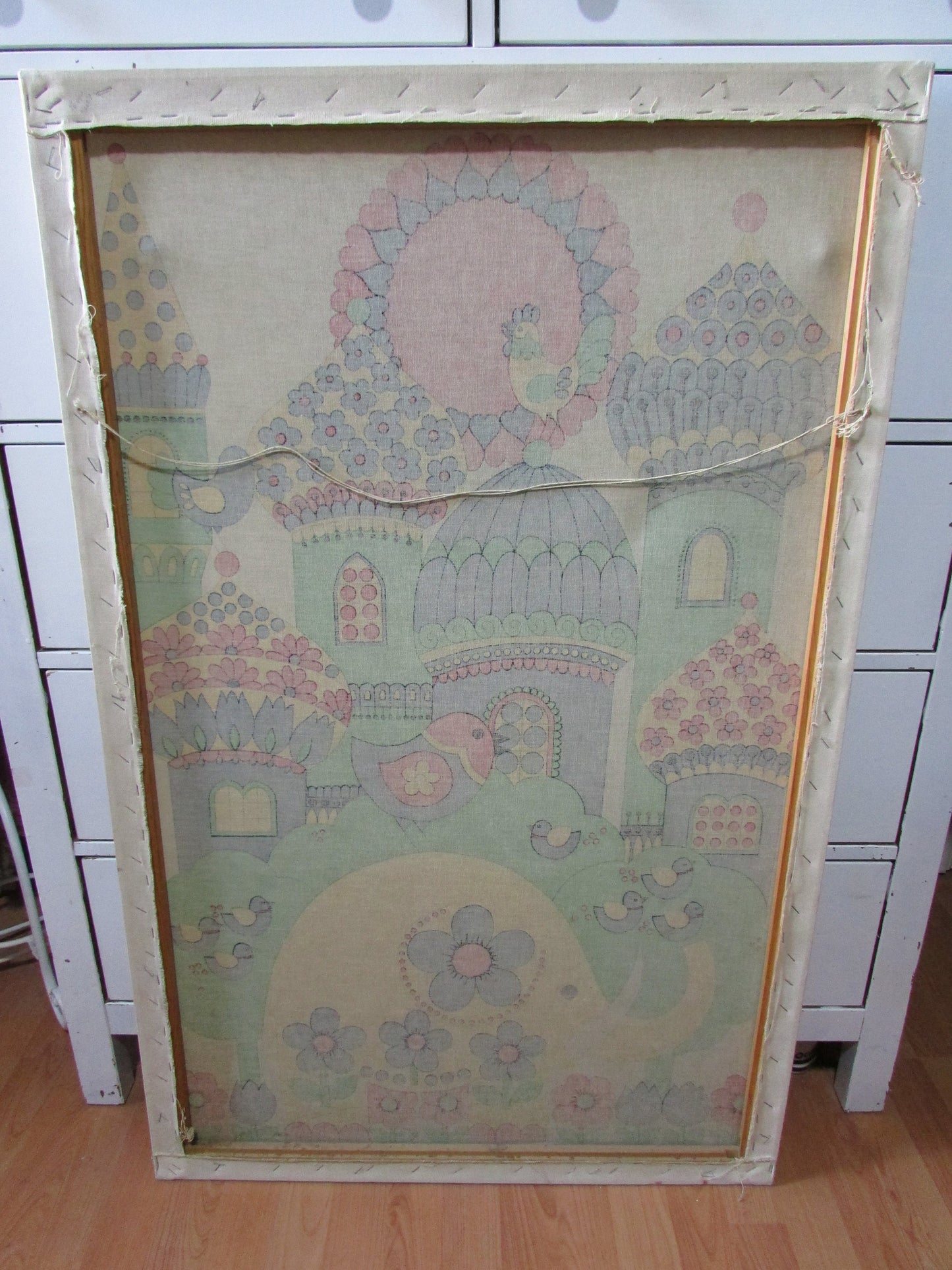 Large 1970s fabric wall hanging of yellow elephant and colourful buildings