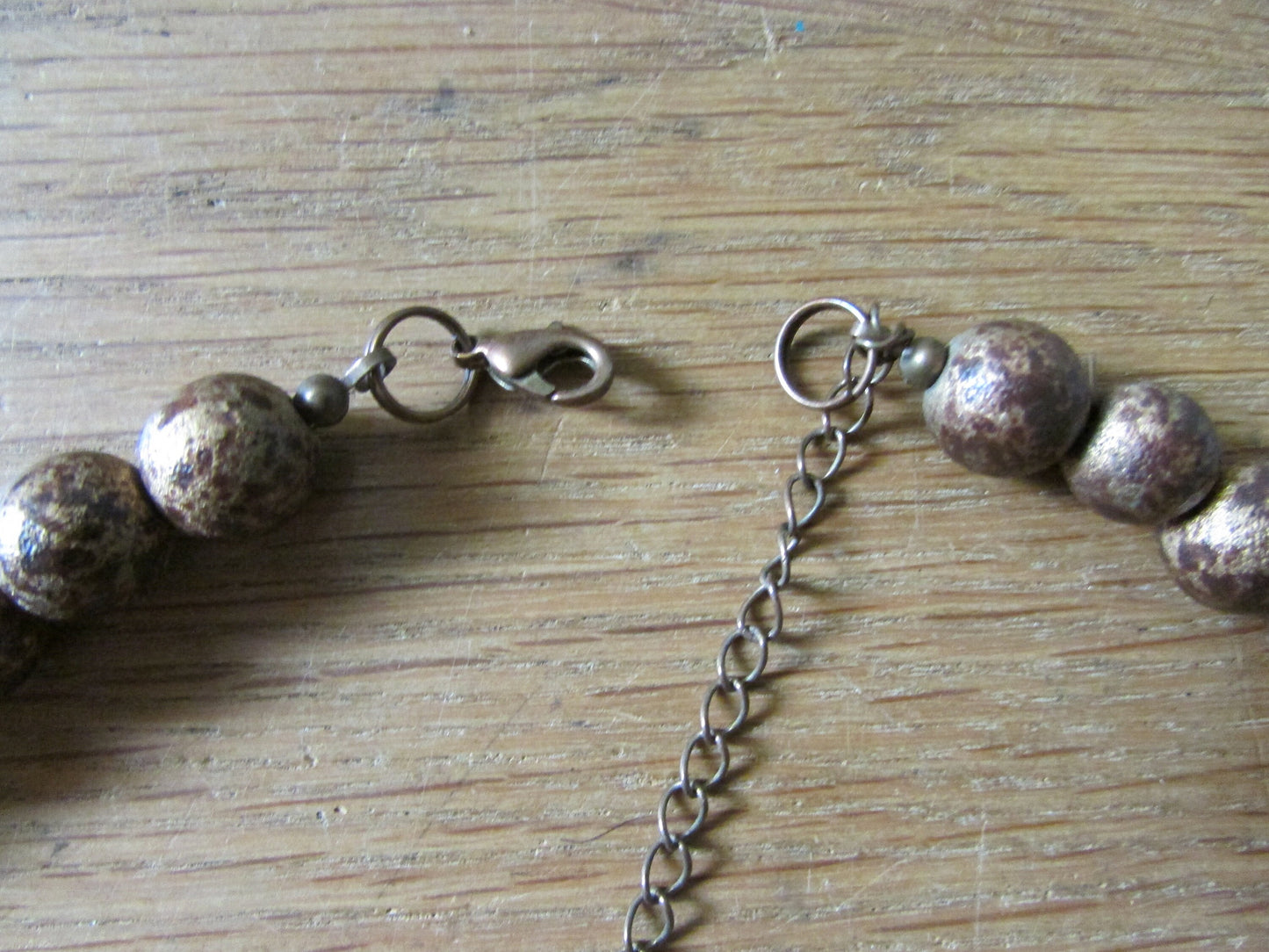 1980s brown, bronze & gold triple strand wooden bead necklace