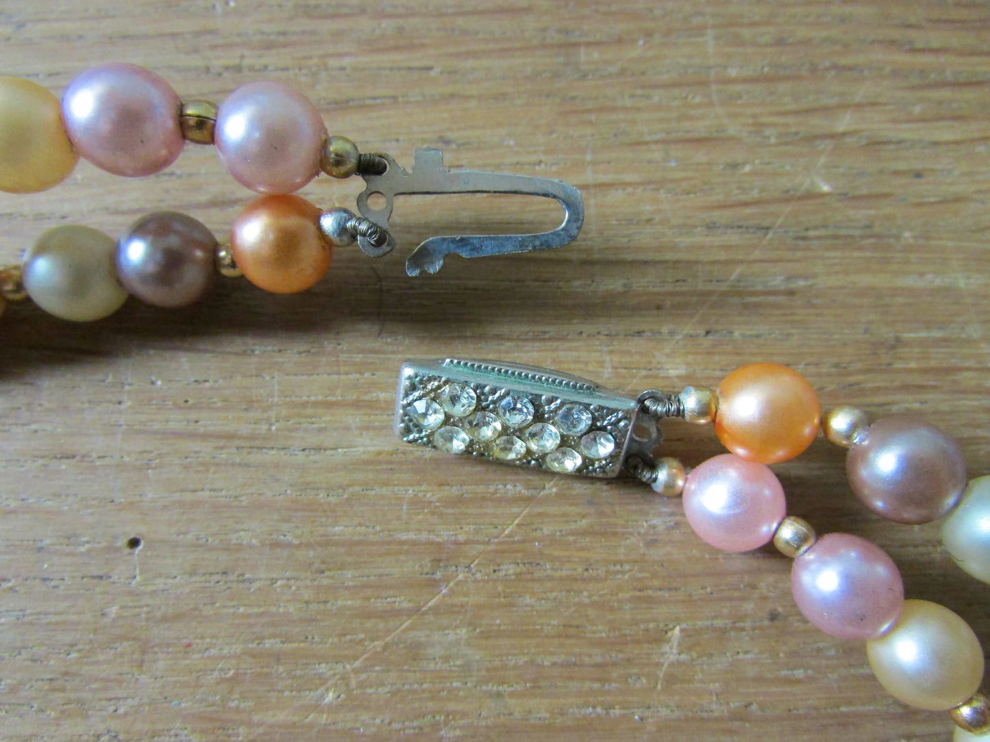 1950s orange & pink tone graduating plastic bead double strand necklace