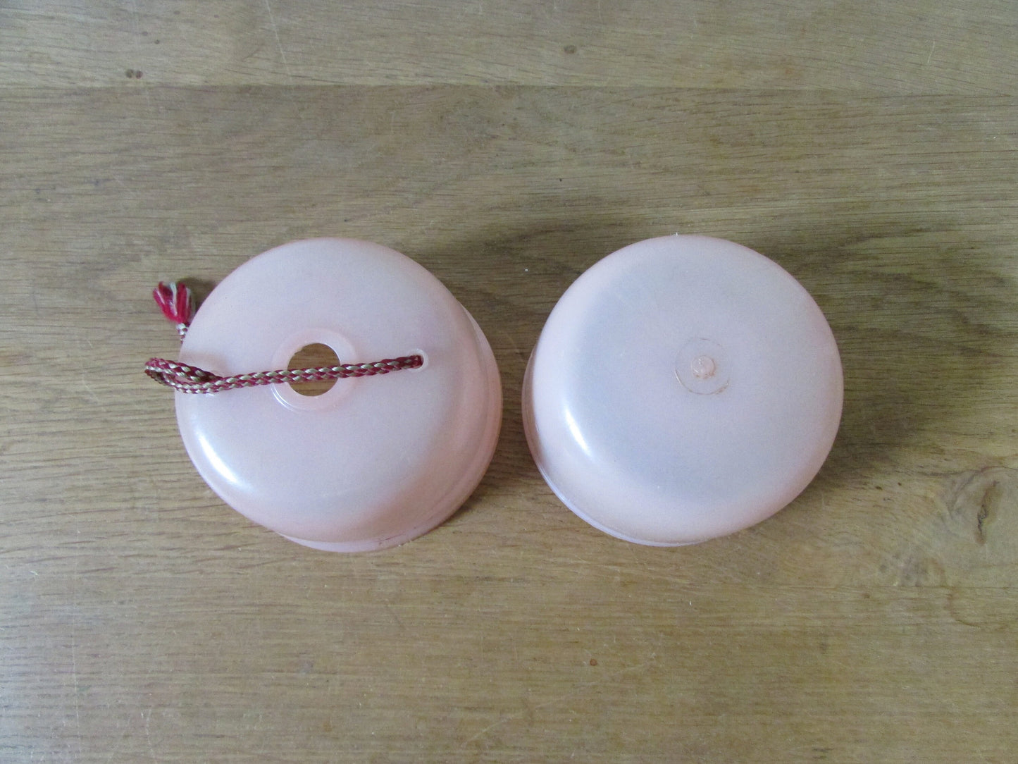Vintage pink plastic wool/string holder