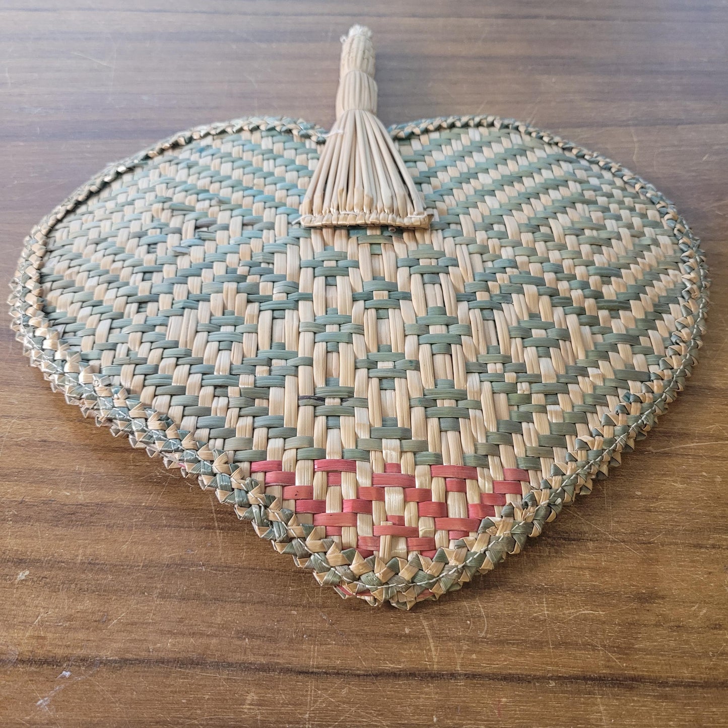 Vintage 1970s-style woven pandanus hand fan