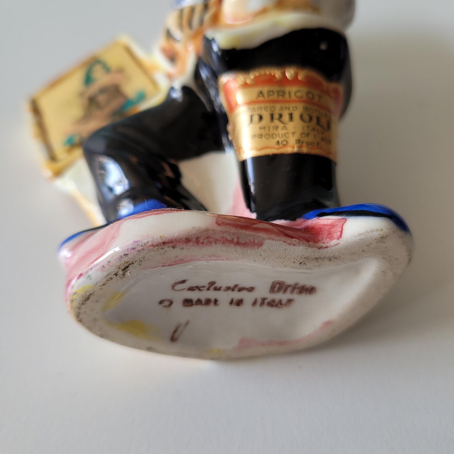 1960s Drioli miniature liquor bottle/decanter: artist & risqué painting, animated