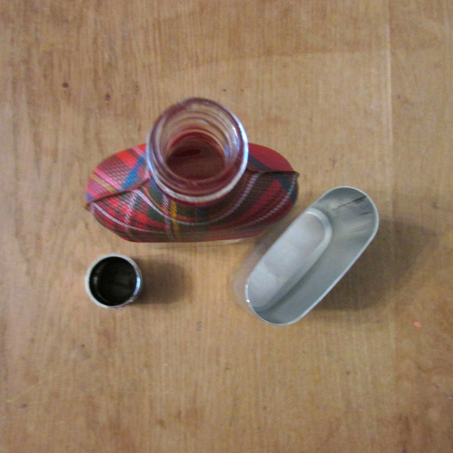 Vintage red tartan & glass hip flask with metal cup and cap