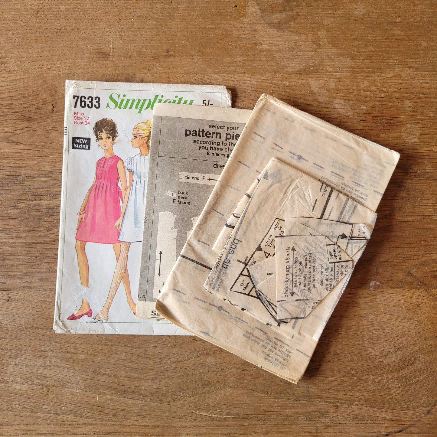 Part cut 1968 Simplicity 7633 sewing pattern for misses' dress in two lengths, size 12 (complete)