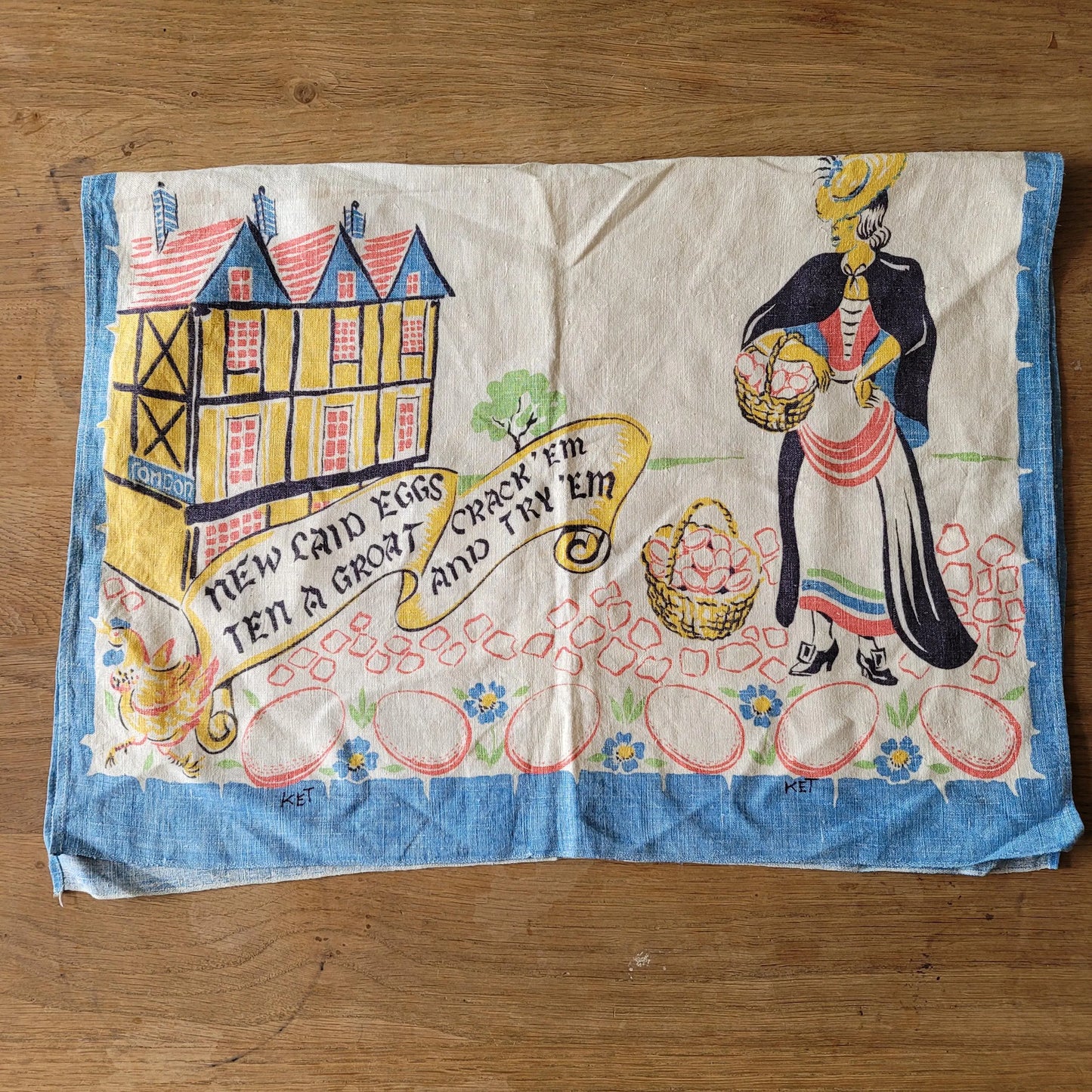 circa. 1930s Irish linen 'New laid eggs.." illustrated tea towel, signed KET