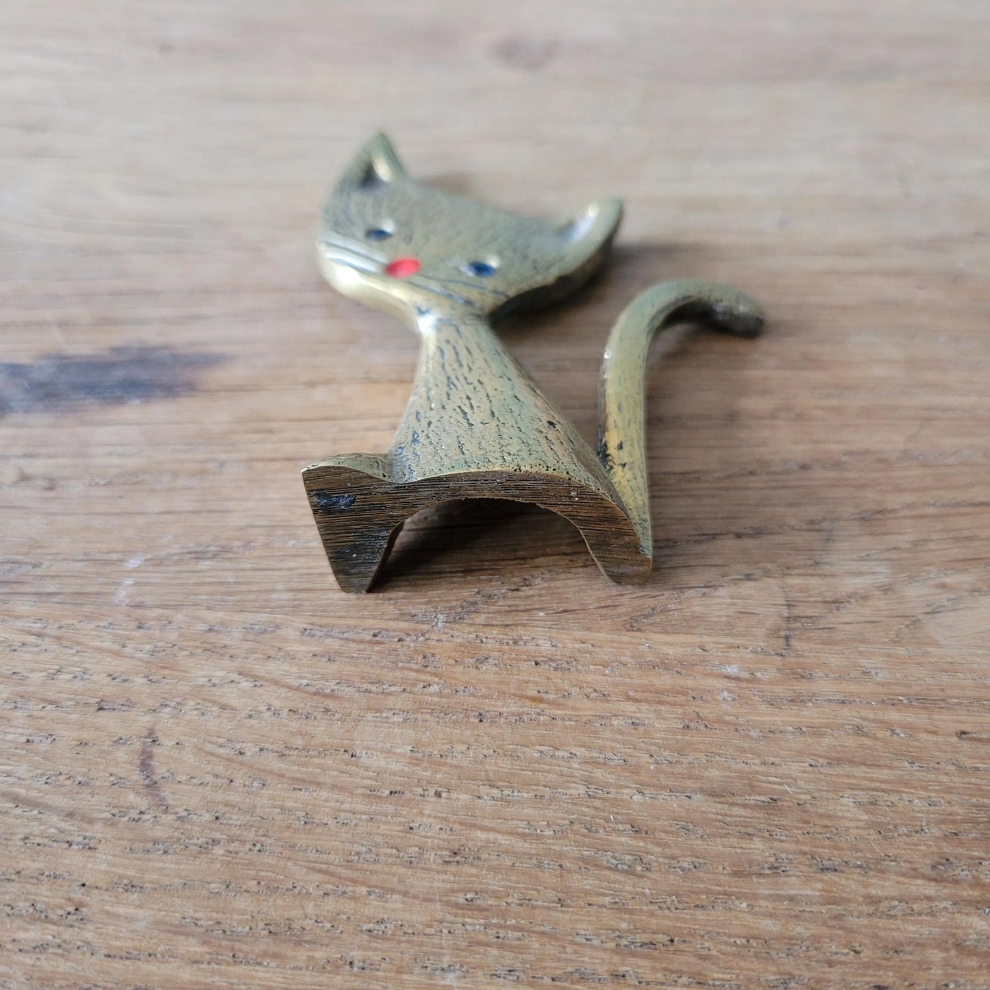 1960s brass kitten ring holder with jewel eyes
