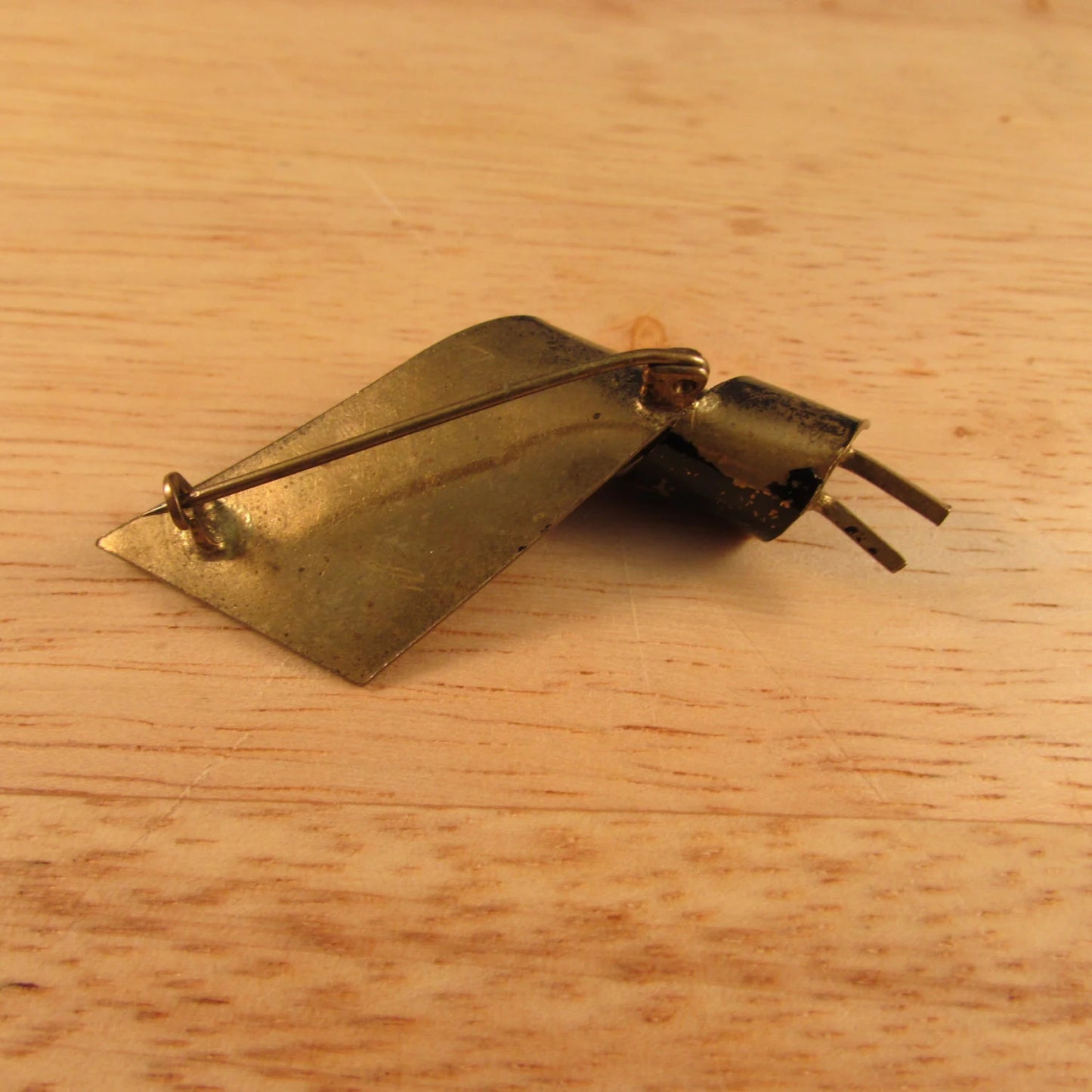 Vintage German gold-tone scroll leaf brooch