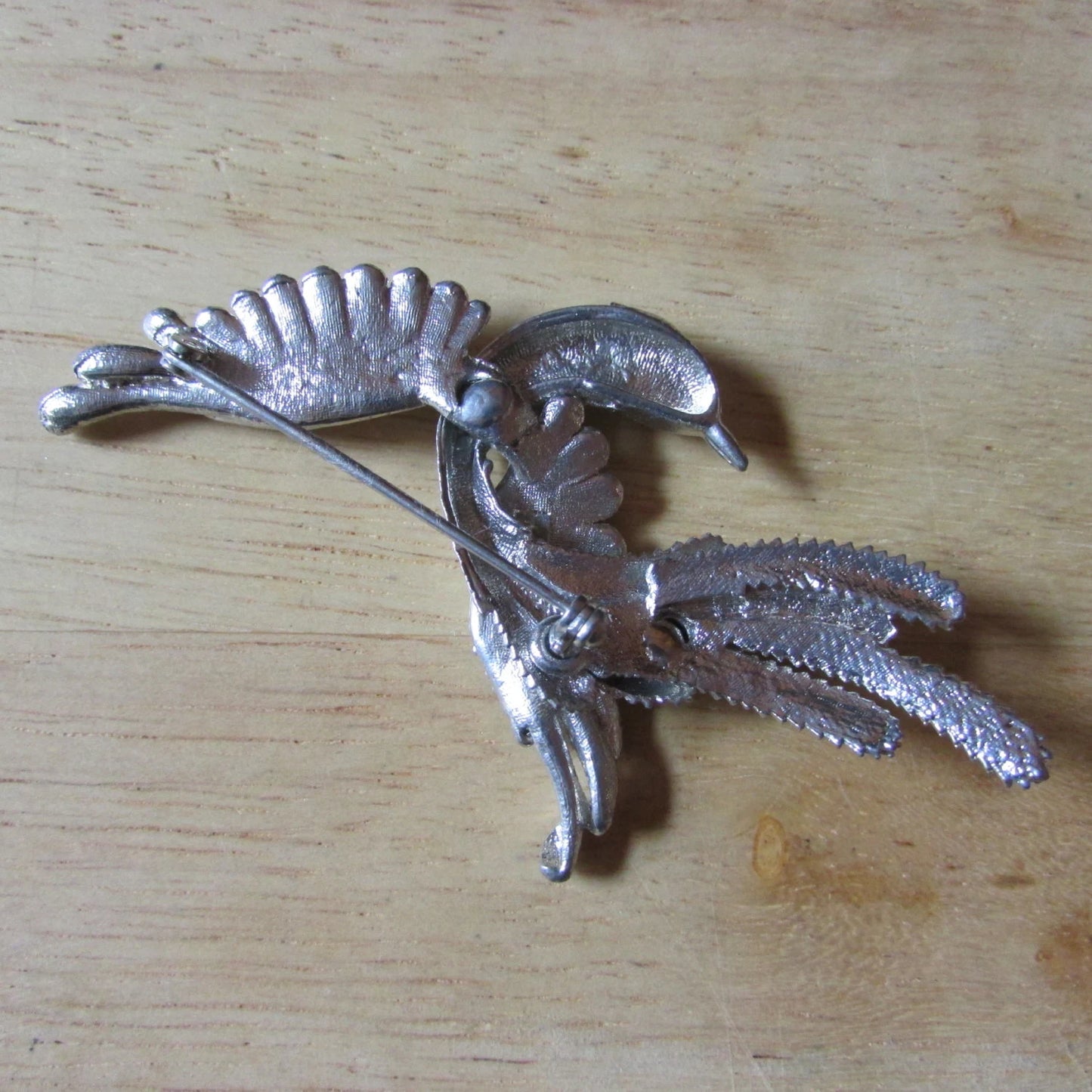 Vintage large silver-tone bird in flight brooch with textured feather detail & diamanté eye