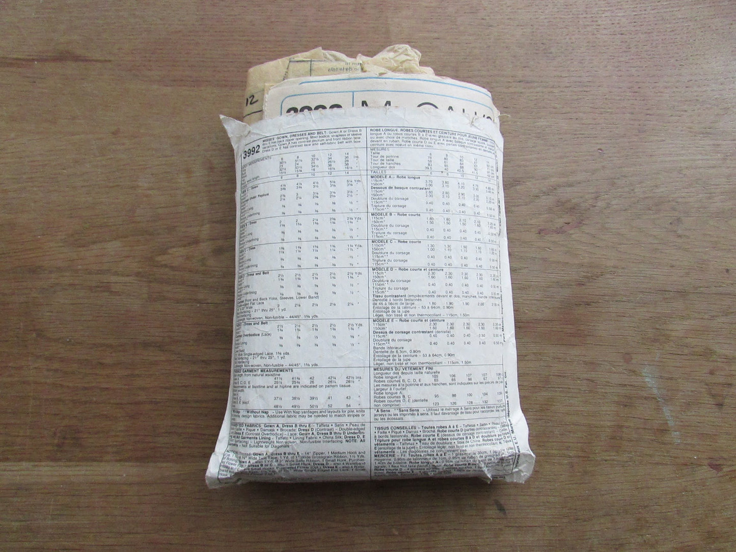 Used 1988 McCall's 3992 sewing pattern for gown, dresses & belt, size 12 (complete) slightly torn in places