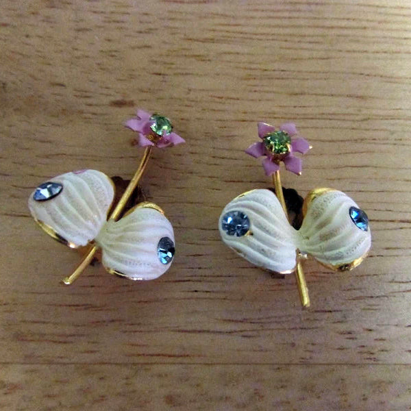 1950s Elizabeth Creations cream enamel floral clip-on earrings with blue rhinestones