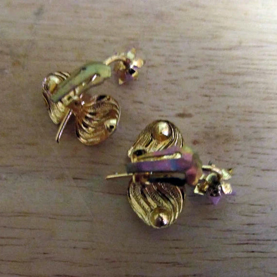 1950s Elizabeth Creations cream enamel floral clip-on earrings with blue rhinestones