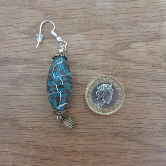 Retro home-made earrings made using vintage abstract pattern beads