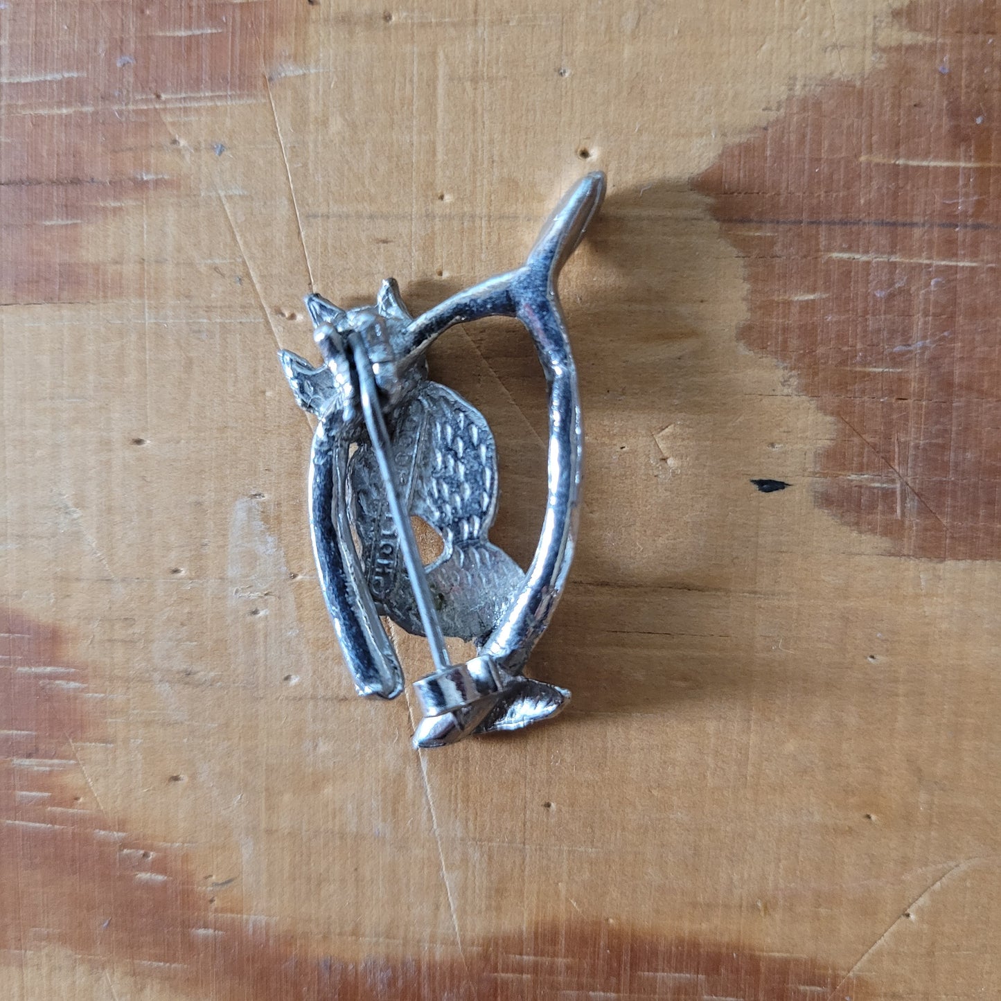 Vintage Hollywood silver-tone wishbone & pixie brooch