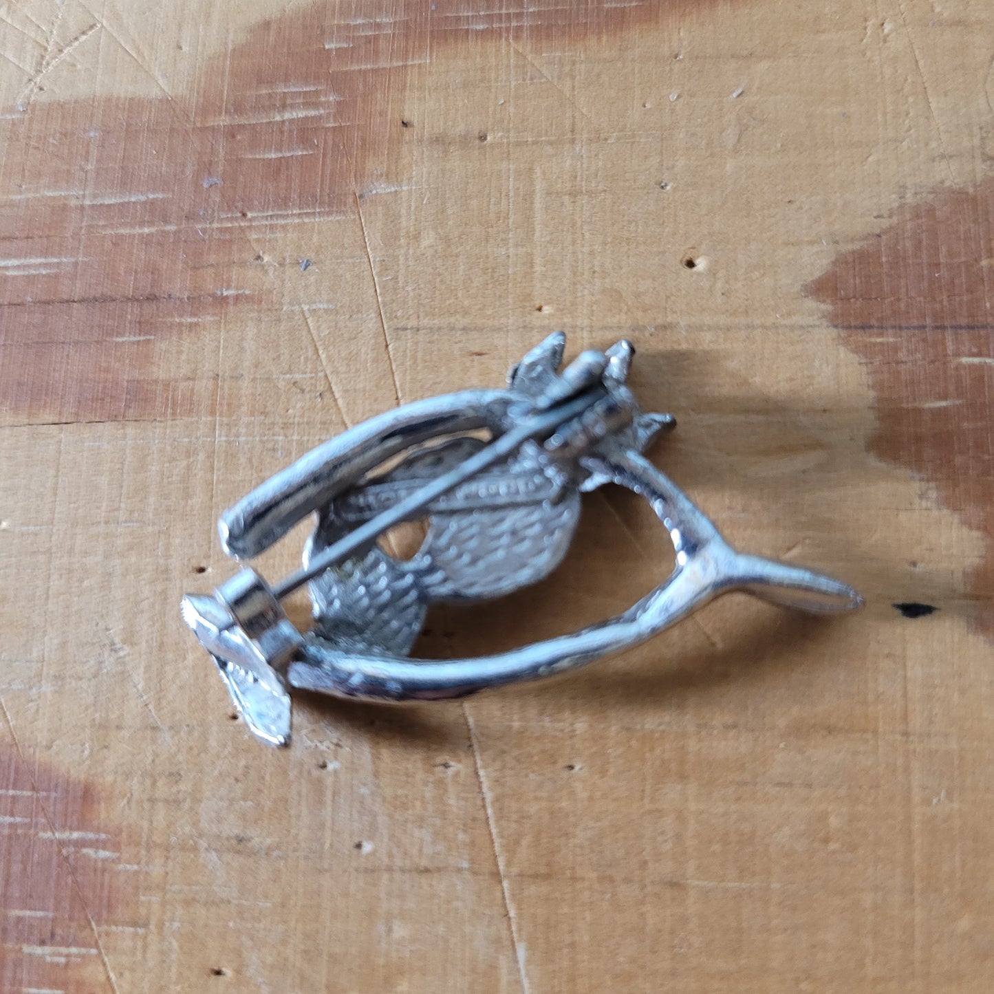 Vintage Hollywood silver-tone wishbone & pixie brooch