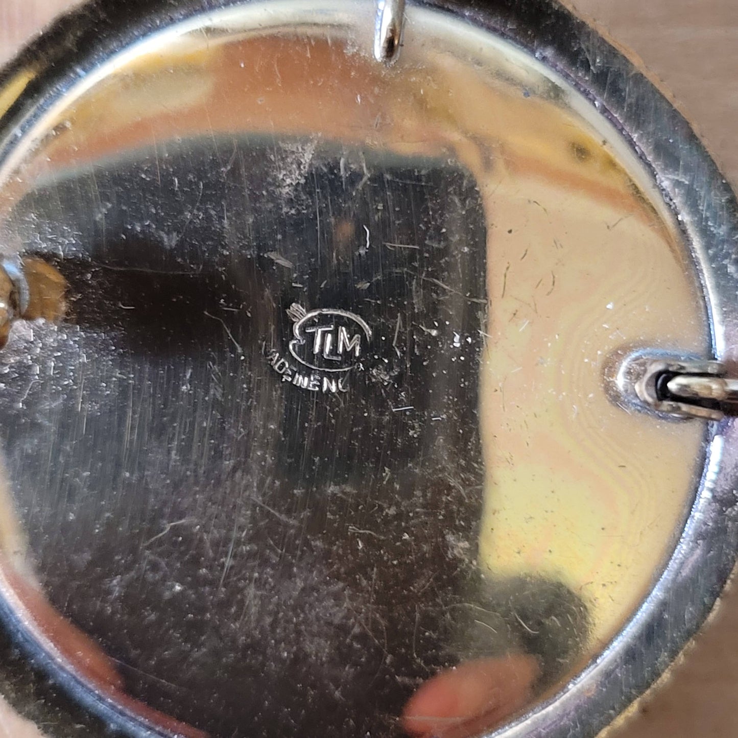 Vintage gold-tone painted butterfly wing brooch/pendant, detailing sailing boat & palm tree