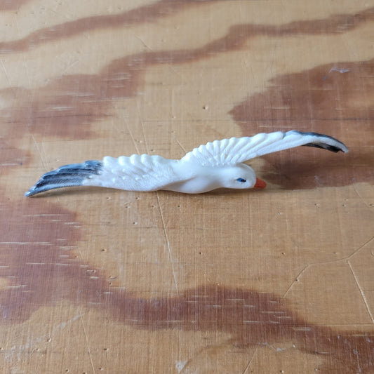 Vintage celluloid seagull in flight brooch