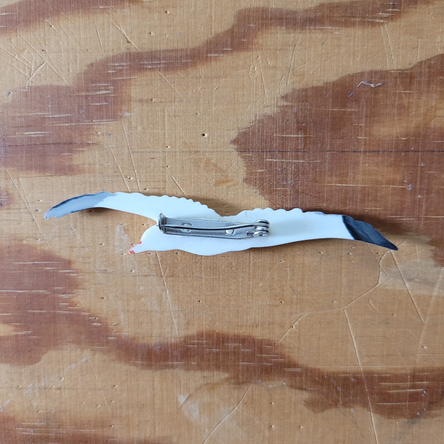 Vintage celluloid seagull in flight brooch