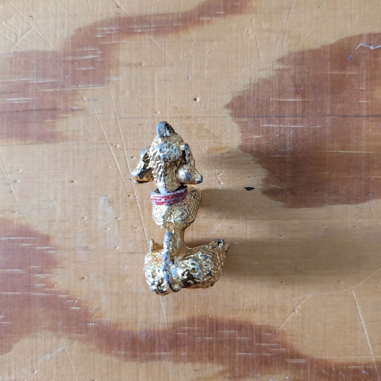 Vintage gold-tone begging French poodle pendant with red collar