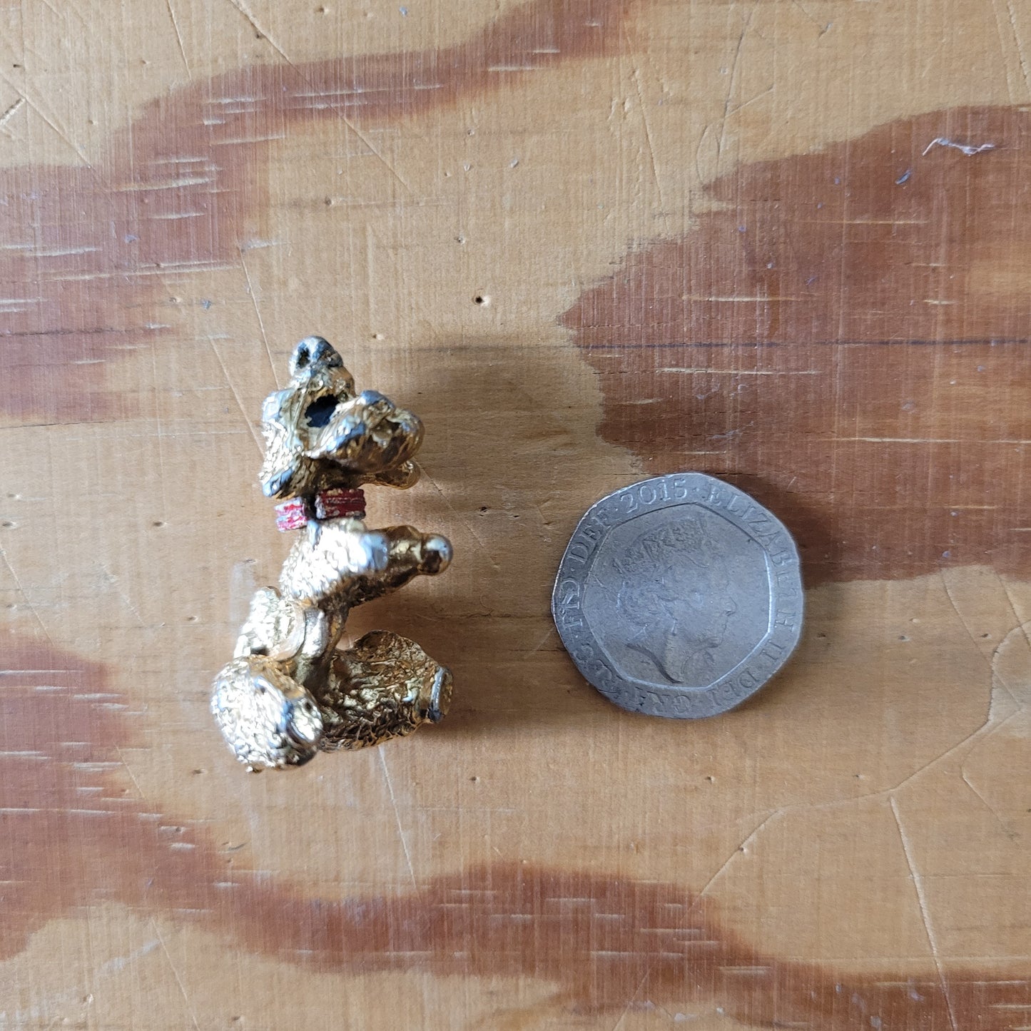 Vintage gold-tone begging French poodle pendant with red collar