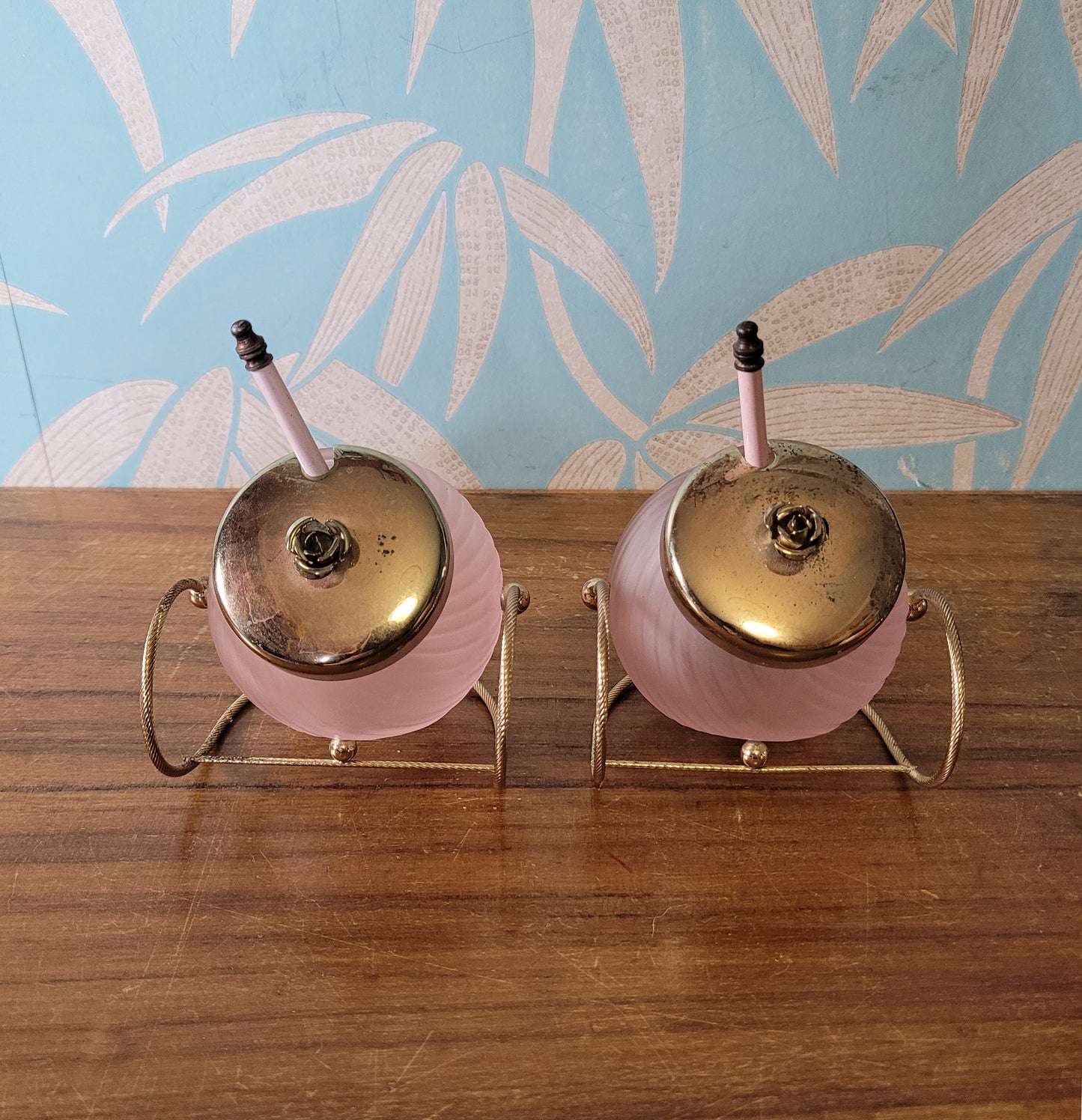 Pair of rare 1970s rose pink glass preserve jars with gold-tone stands & lids