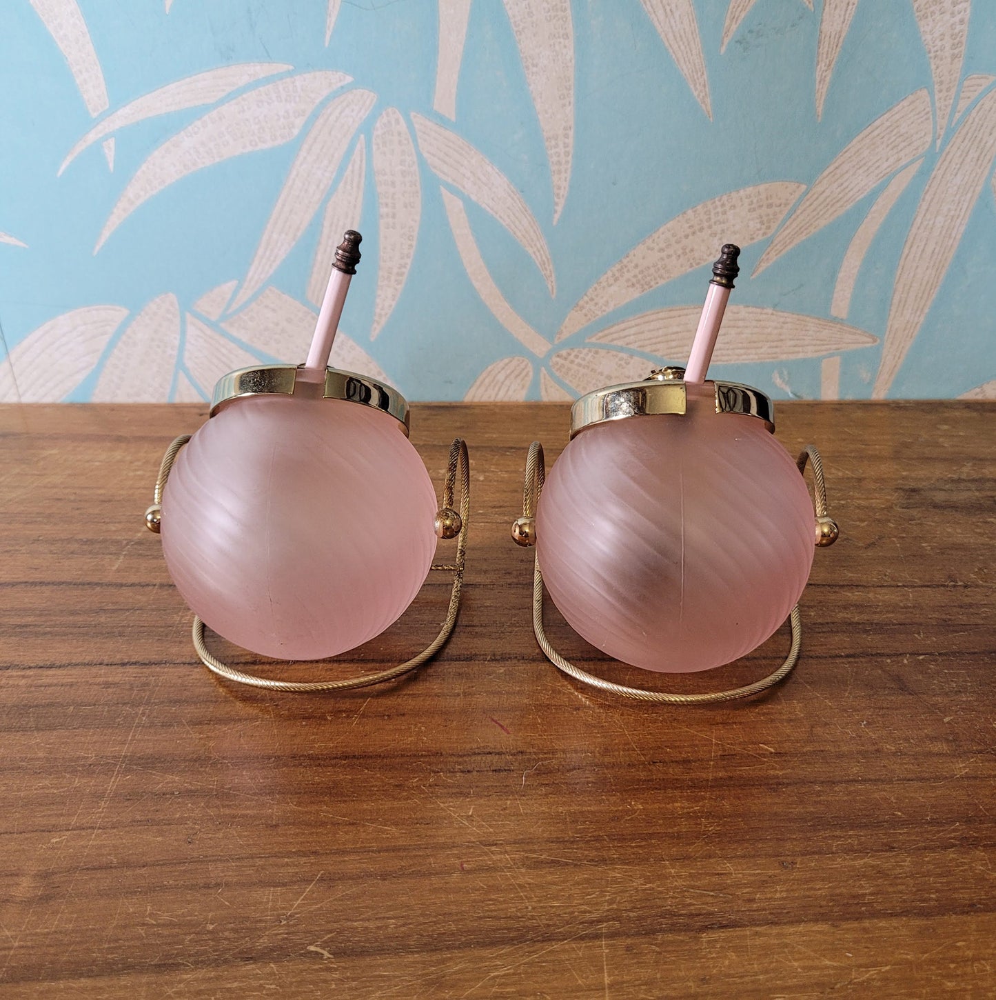 Pair of rare 1970s rose pink glass preserve jars with gold-tone stands & lids