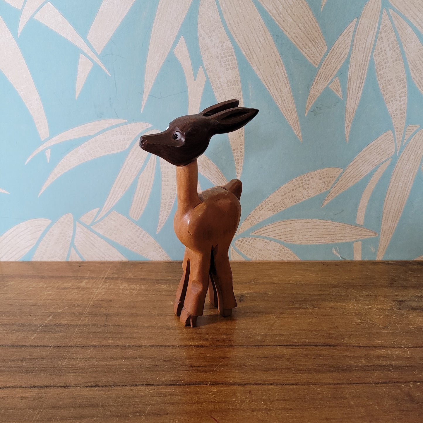 Mid-century hand-crafted mismatched wooden deer corkscrew with googly eyes