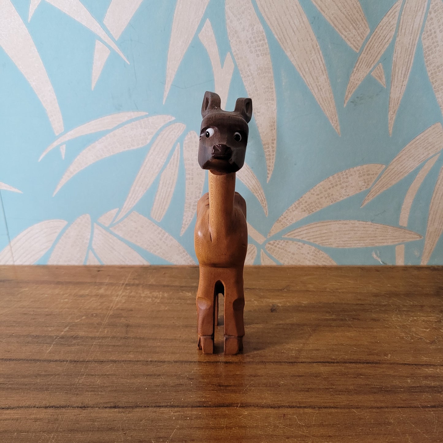 Mid-century hand-crafted mismatched wooden deer corkscrew with googly eyes