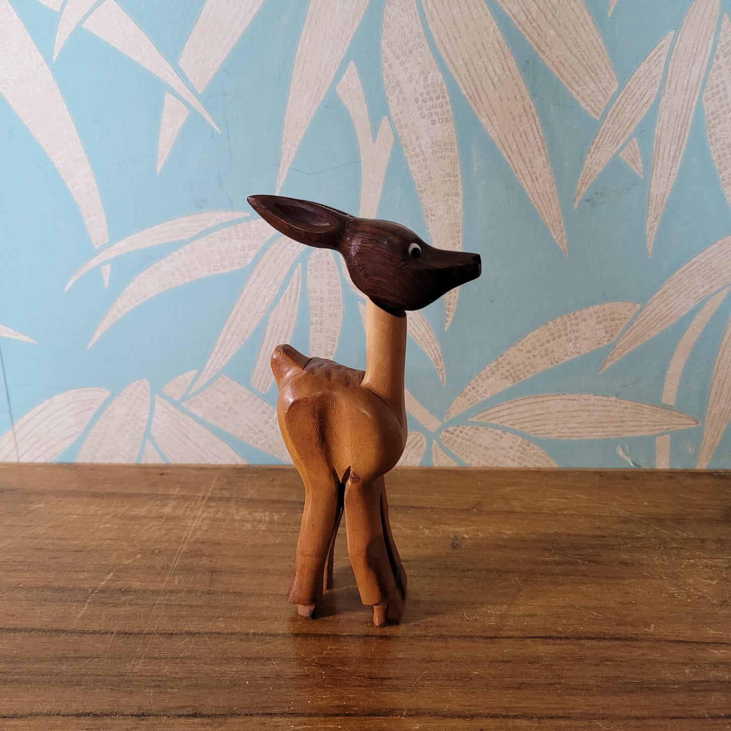 Mid-century hand-crafted mismatched wooden deer corkscrew with googly eyes