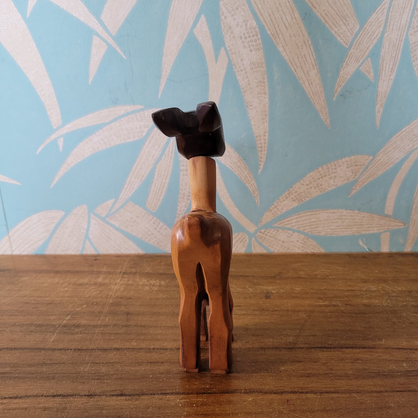 Mid-century hand-crafted mismatched wooden deer corkscrew with googly eyes