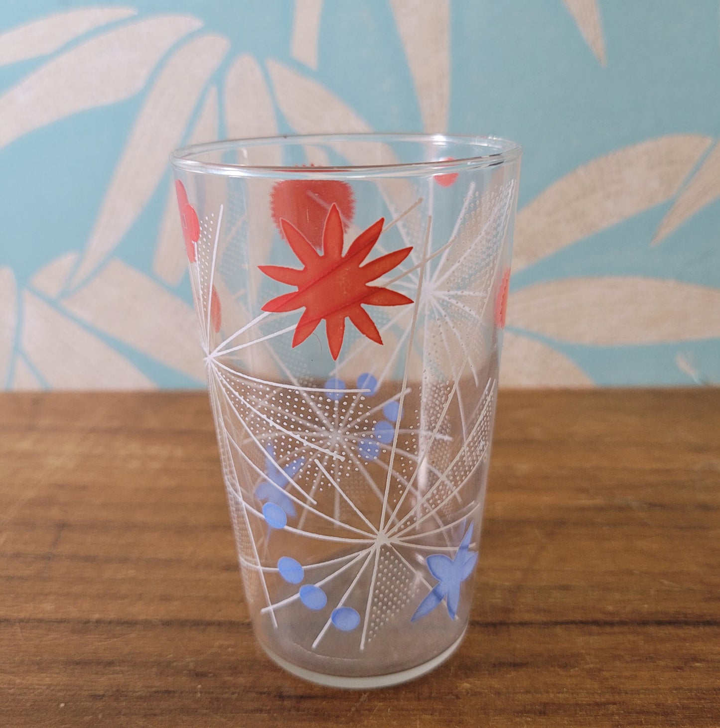 Three 1950s atomic starburst patterned glass tumblers