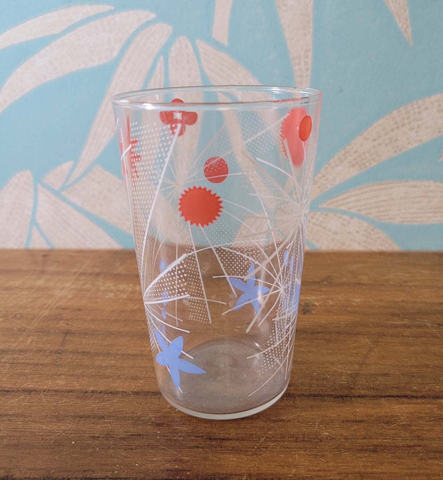 Three 1950s atomic starburst patterned glass tumblers