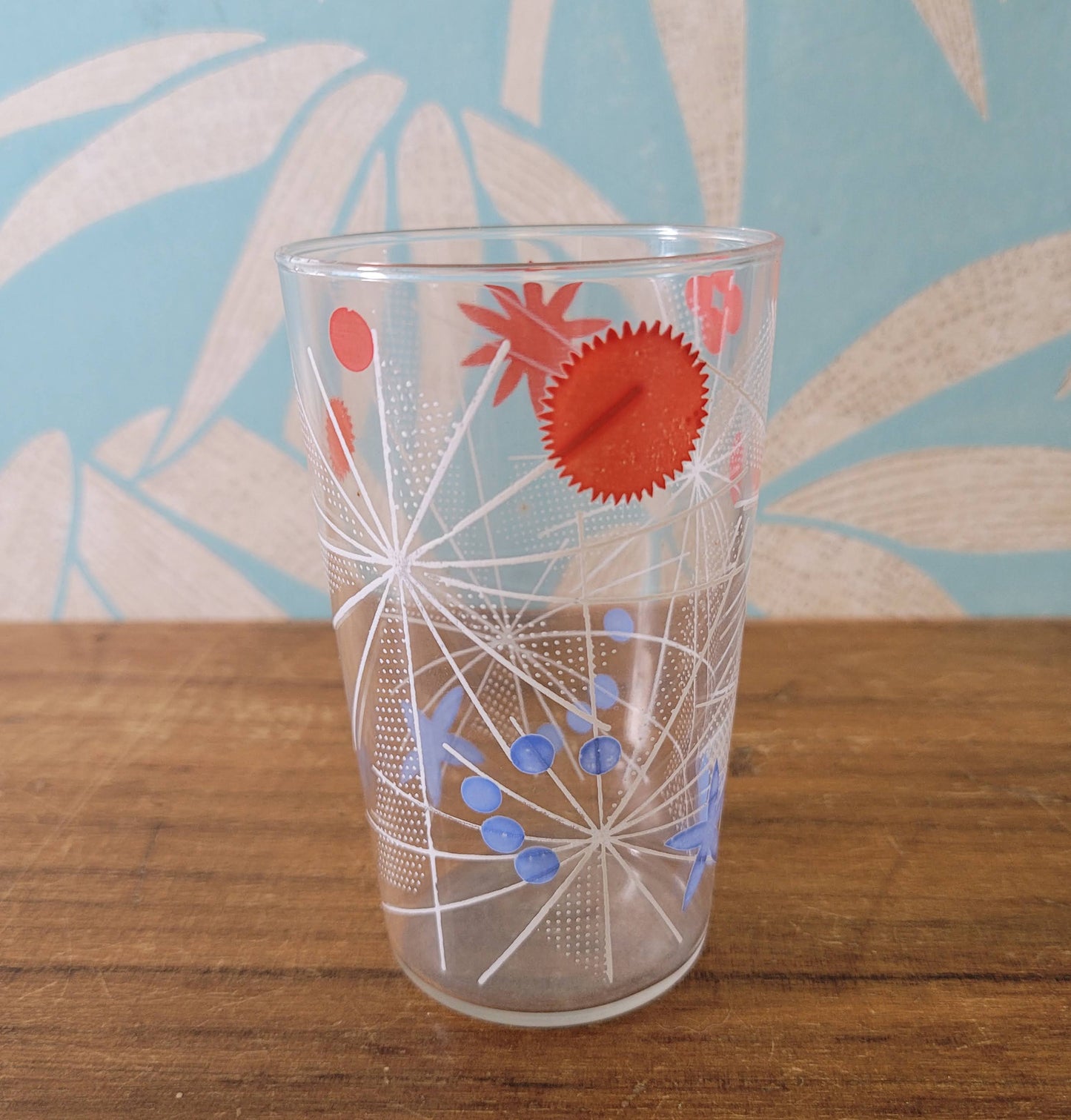 Three 1950s atomic starburst patterned glass tumblers