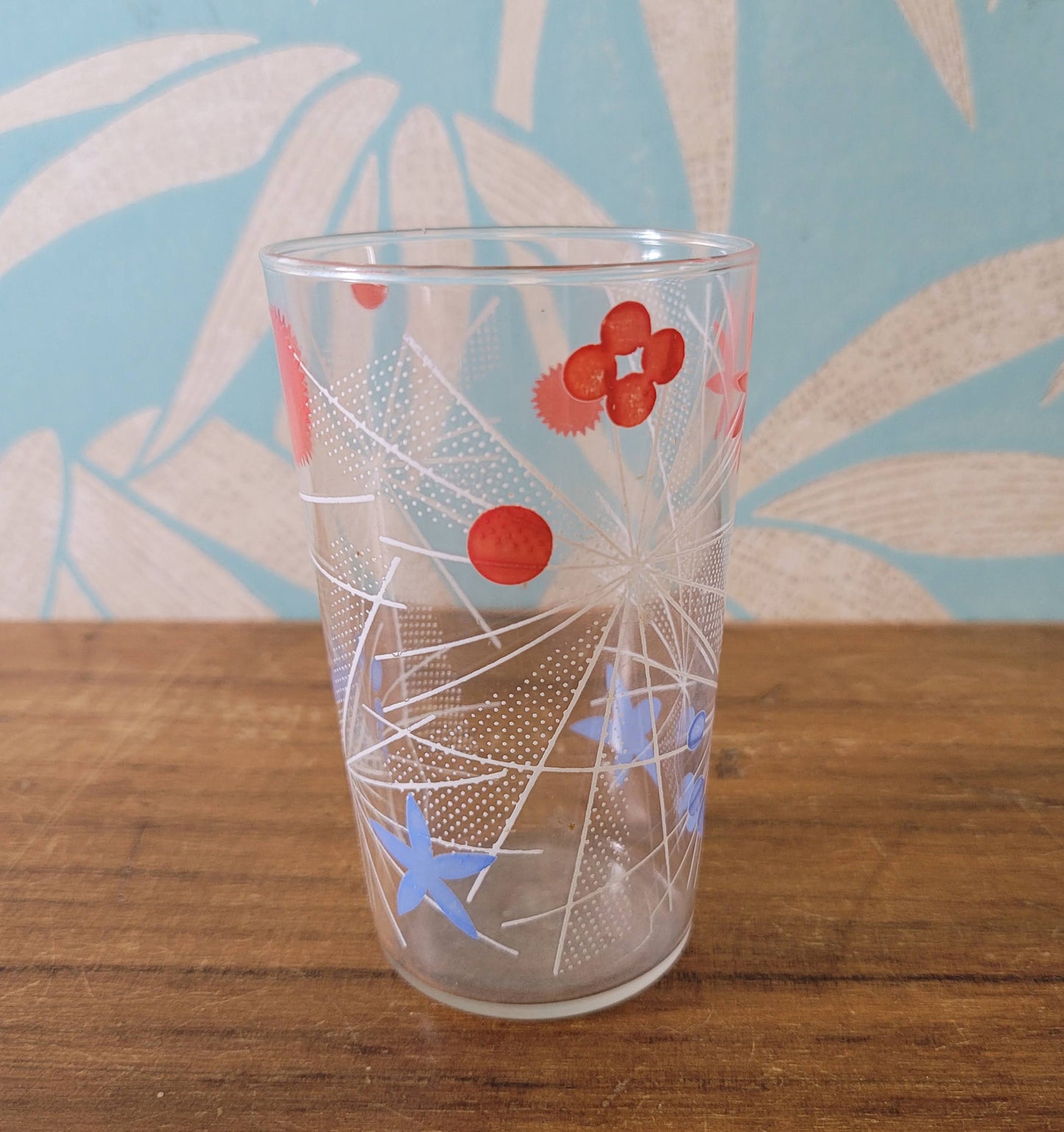 Three 1950s atomic starburst patterned glass tumblers