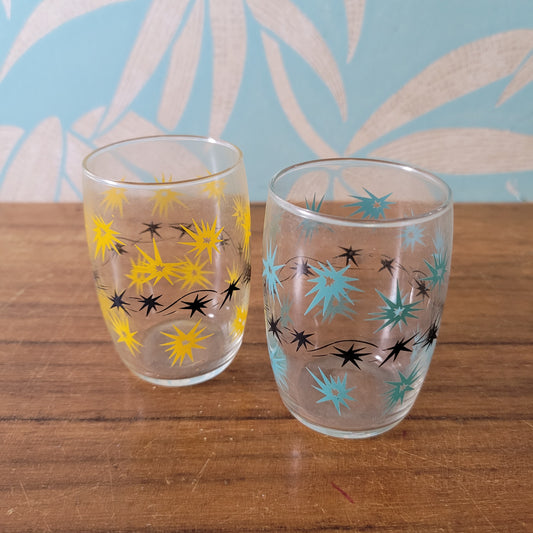 Two 1950s/60s yellow/black, & turquoise/black atomic starburst juice glasses