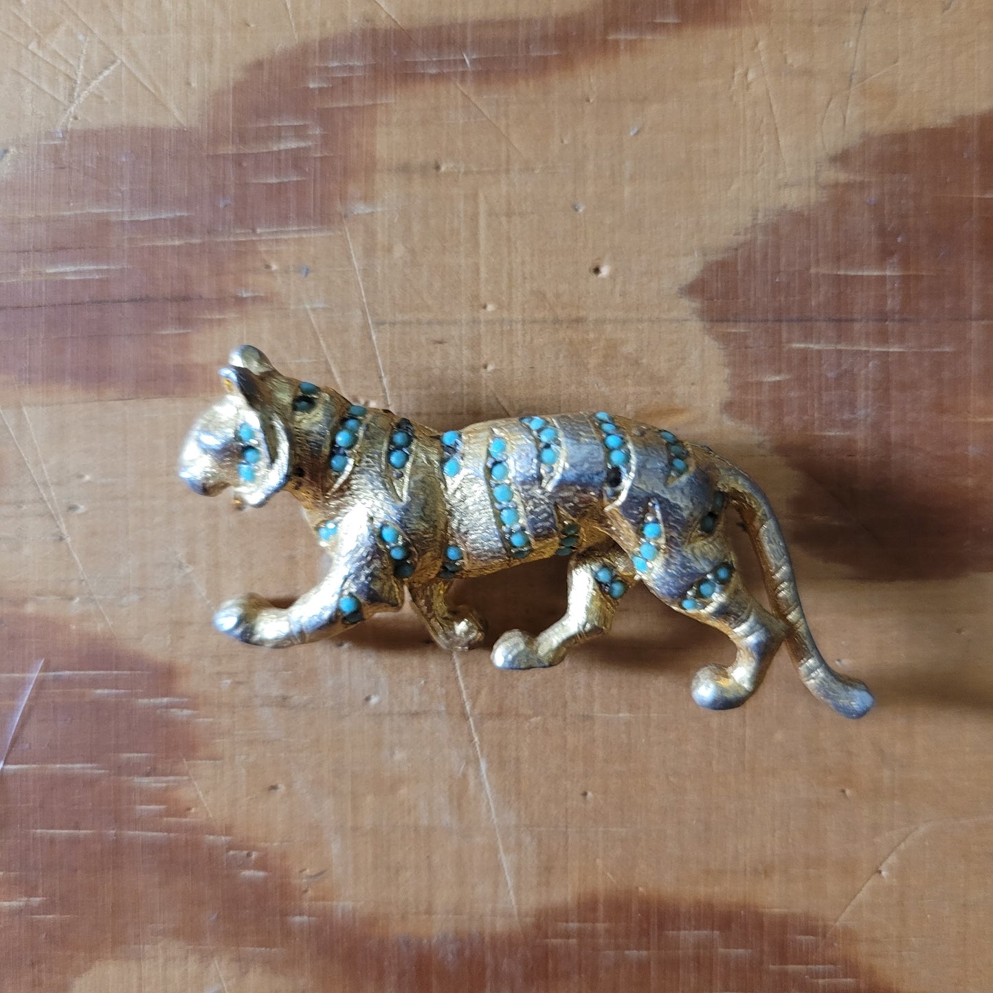 Mid-century Hollywood gold-tone and turquoise bead panther brooch