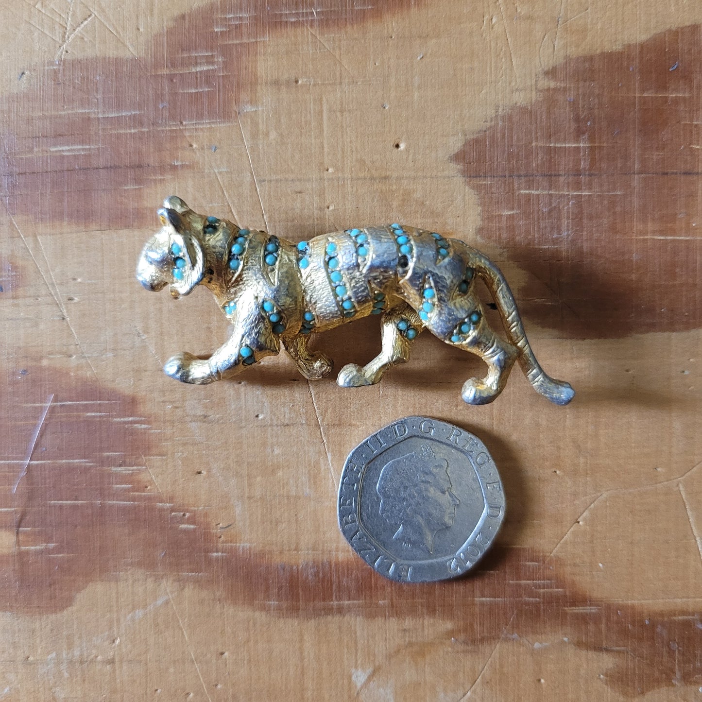 Mid-century Hollywood gold-tone and turquoise bead panther brooch