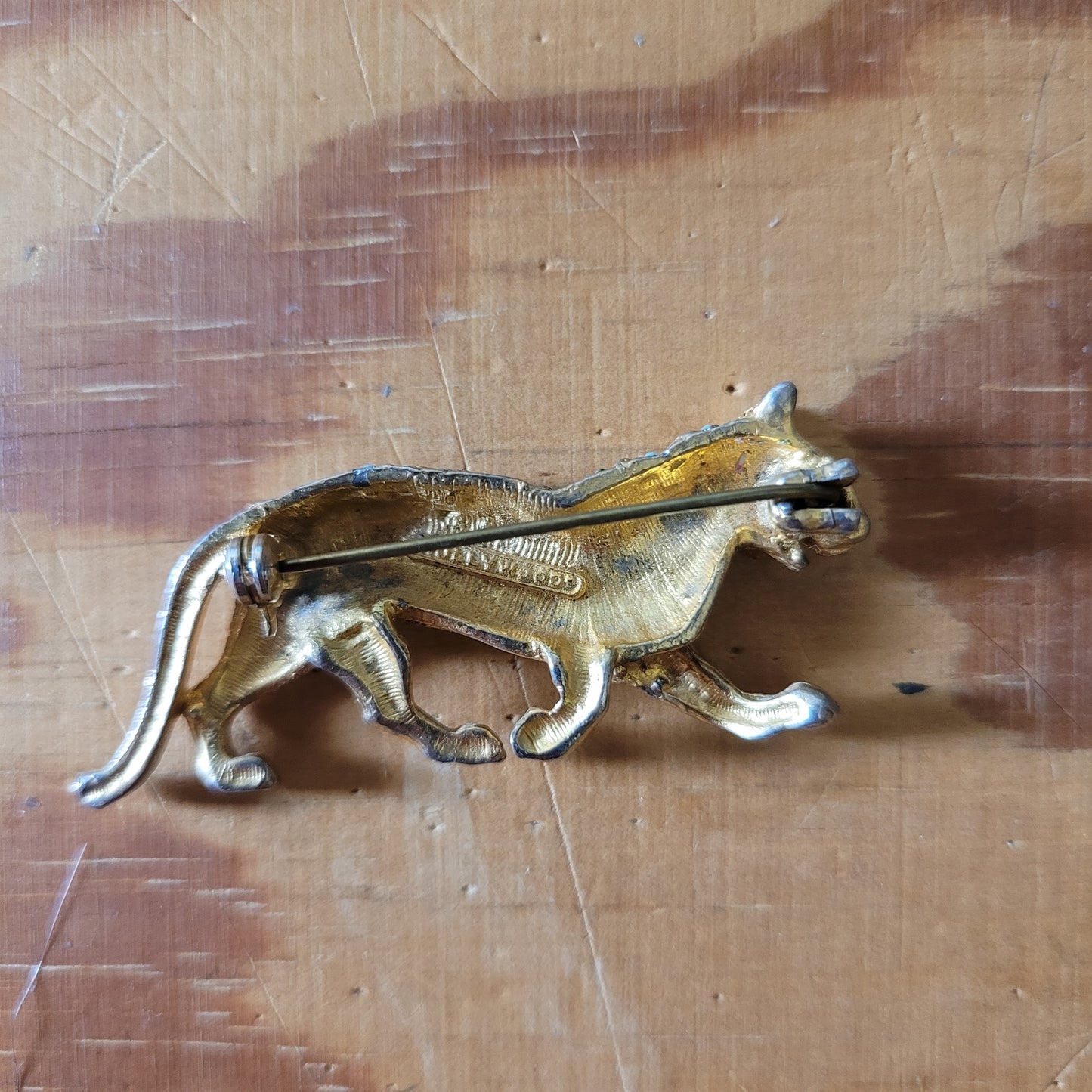 Mid-century Hollywood gold-tone and turquoise bead panther brooch