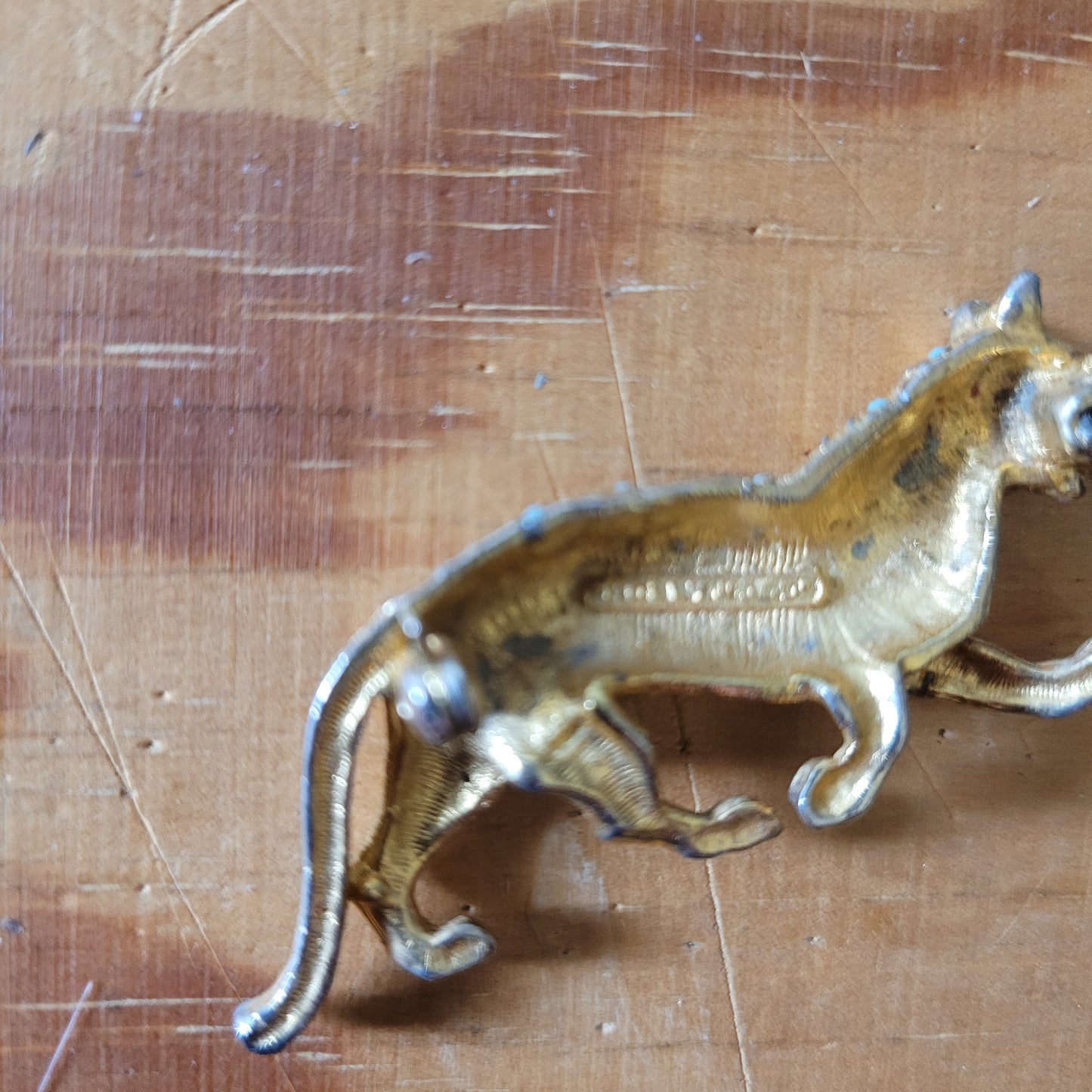 Mid-century Hollywood gold-tone and turquoise bead panther brooch