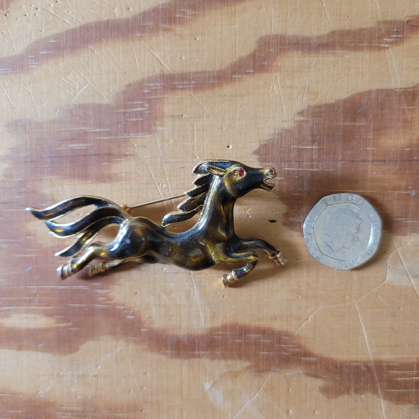 Vintage brown enamel galloping horse brooch