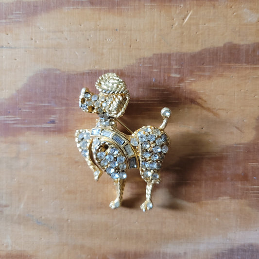 1960s gold-tone & rhinestone prancing French poodle brooch