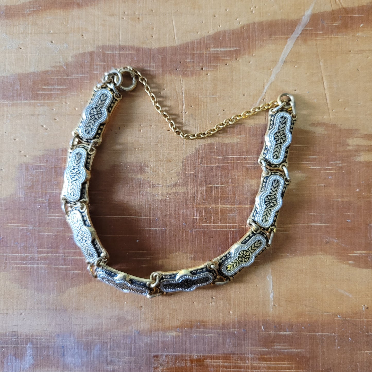 Vintage Damascene silver & gold-tone link bracelet with safety chain.