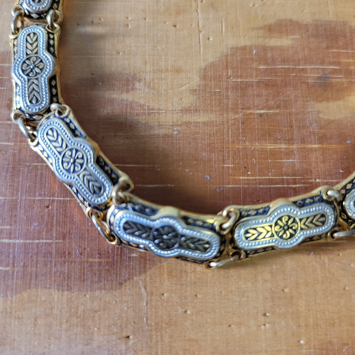 Vintage Damascene silver & gold-tone link bracelet with safety chain.