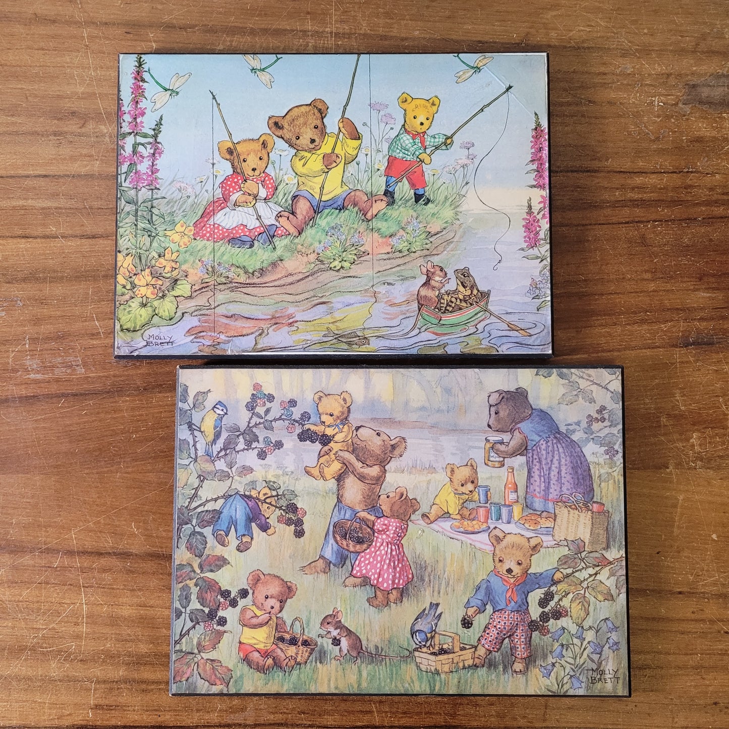 Pair of vintage Molly Brett prints on hardboard - Teddies Fishing, & Teddy Bears and Blackberries