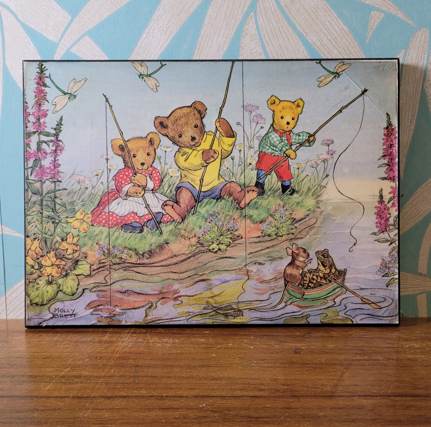 Pair of vintage Molly Brett prints on hardboard - Teddies Fishing, & Teddy Bears and Blackberries