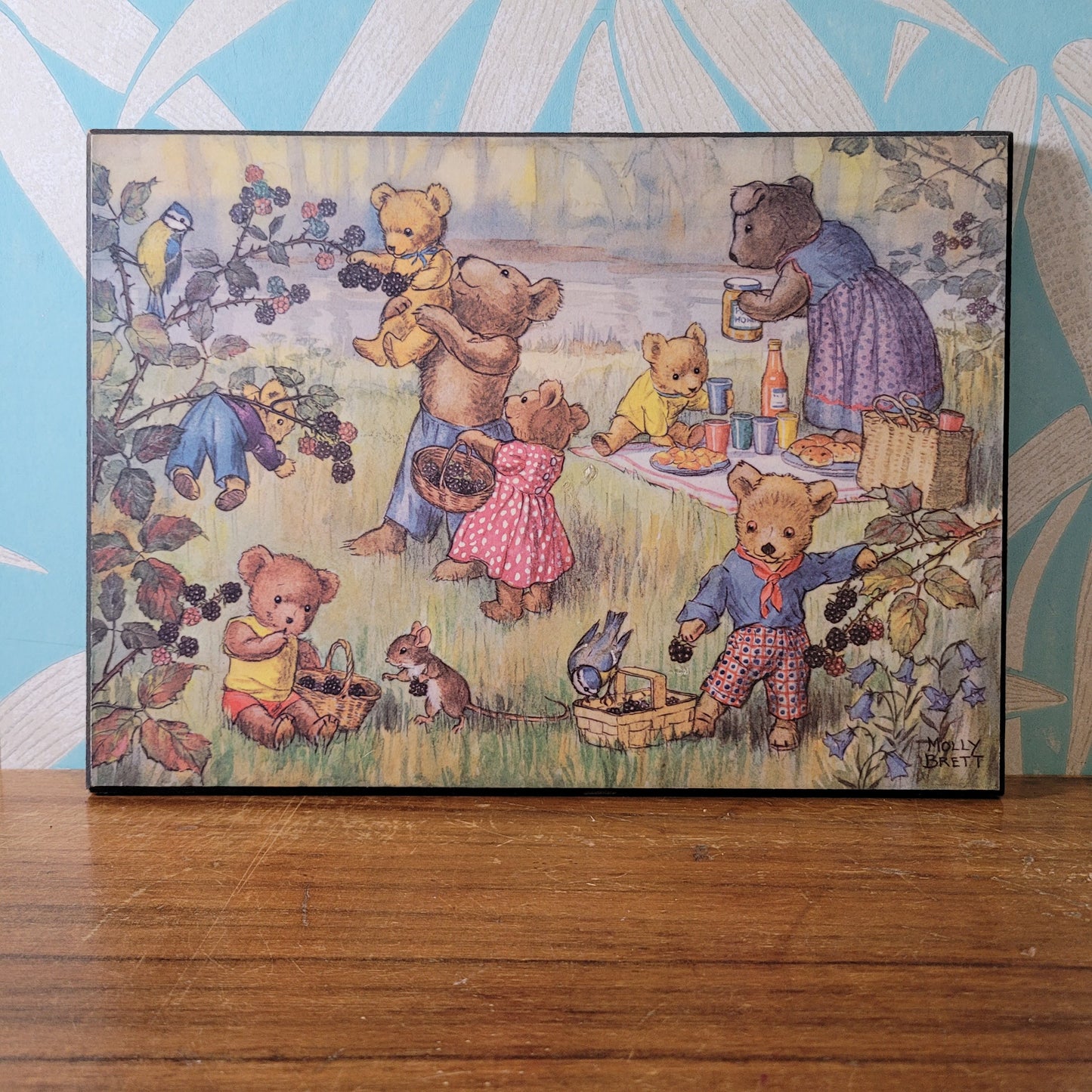 Pair of vintage Molly Brett prints on hardboard - Teddies Fishing, & Teddy Bears and Blackberries