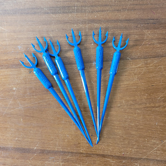 Vintage plastic trident cocktail stirrer, stamped PICON