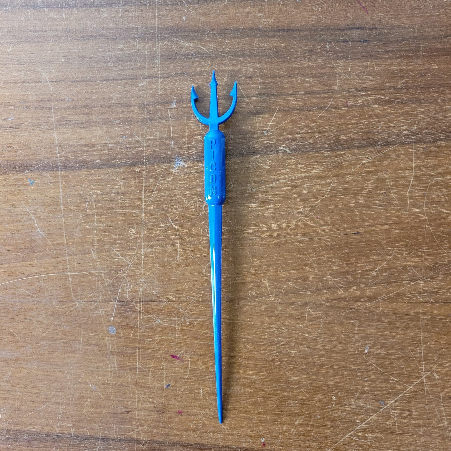 Vintage plastic trident cocktail stirrer, stamped PICON