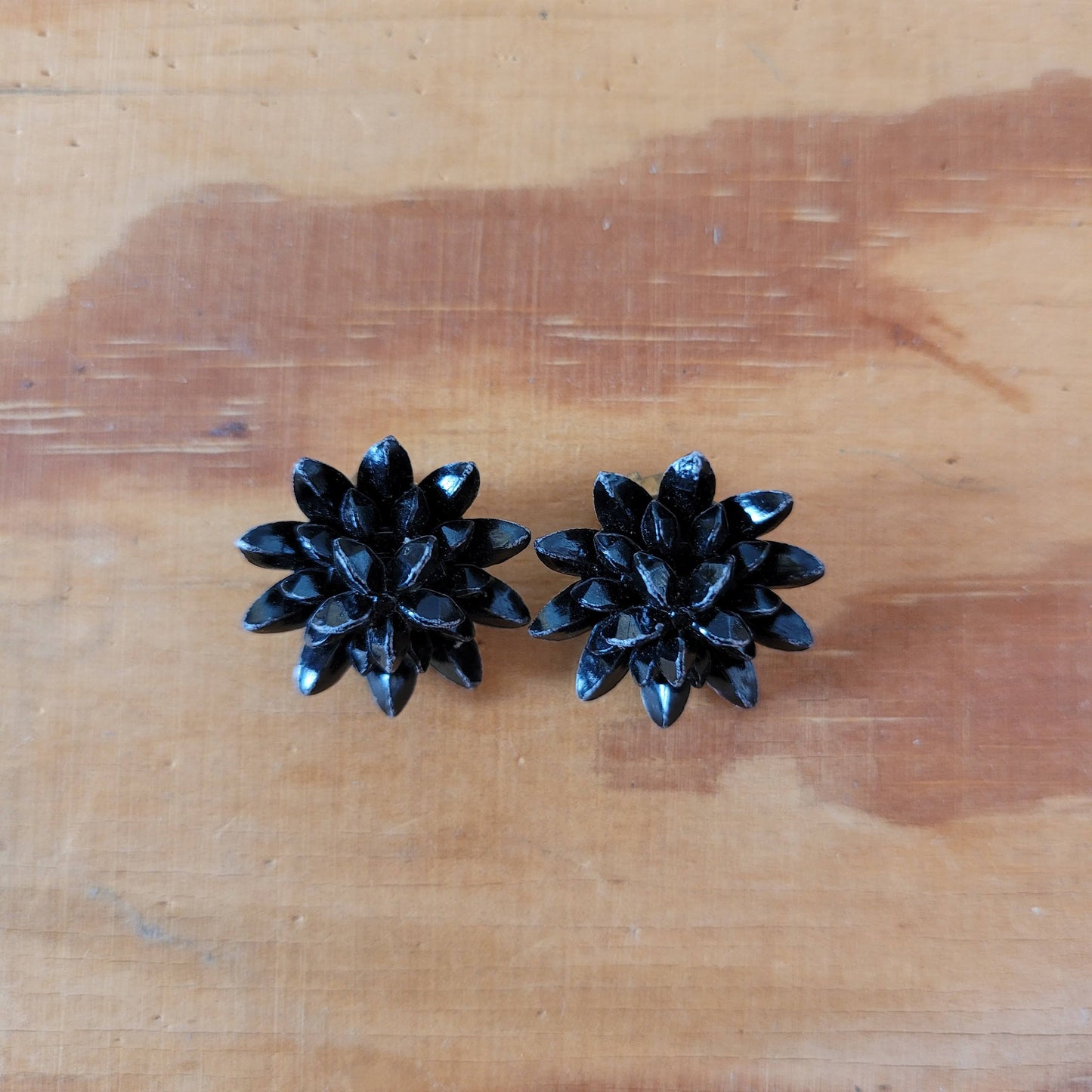 1950s black plastic three dimensional star-shaped clip-on earrings